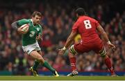14 March 2015; Jared Payne, Ireland, in action against Toby Faletau, Wales. RBS Six Nations Rugby Championship, Wales v Ireland, Millennium Stadium, Cardiff, Wales. Picture credit: Brendan Moran / SPORTSFILE