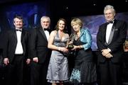17 November 2007; Briege Corkery, Cork, is presented with her Allstar award by Geraldine Giles, President, Cumann Paul na mBan, in the company of An Taoiseach Bertie Ahern, TD, Pol O Callachoir, left, Ceannsai, TG4 and Tony Towell, O'Neills, at the 2007 O'Neills/TG4 Ladies Football All-Star Awards. Citywest Hotel, Conference, Leisure & Golf Resort, Saggart, Co Dublin. Picture credit: Brendan Moran / SPORTSFILE