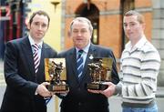 5 March 2008: Tipperary hurler Eoin Kelly, left, and Monaghan footballer Tommy Freeman, right, are presented with the Vodafone GAA Player of the Month Awards for February by Nickey Brennan, President of the GAA, at a luncheon in Dublin. The Westbury Hotel, Dublin. Picture credit: Pat Murphy / SPORTSFILE  *** Local Caption ***