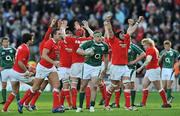 8 March 2008; Ireland's Jamie Heaslip is left in possession as the Wales players celebrate at the final whistle. RBS Six Nations Rugby Championship, Ireland v Wales, Croke Park, Dublin. Picture credit: Brian Lawless / SPORTSFILE
