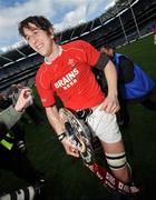 8 March 2008; Wales captain Ryan Jones leaves the pitch with the Triple Crown trophy. RBS Six Nations Rugby Championship, Ireland v Wales, Croke Park, Dublin. Picture credit: Brian Lawless / SPORTSFILE