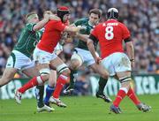 8 March 2008; Jonathan Thomas, Wales, is tackled by Ireland's Jamie Heaslip, left, and David Wallace. RBS Six Nations Rugby Championship, Ireland v Wales, Croke Park, Dublin. Picture credit: Brian Lawless / SPORTSFILE