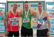 15 March 2015; Tomas Griffin, centre, An Riocht AC, Co. Kerry, winner of the Men's W40 Long Jump event with second placed Gary Gallagher, Lifford AC, Co. Donegal and right, third placed Kevin Byrne, DSD AC, Co. Dublin, during the GloHealth National Masters Indoor Track and Field Championships. Athlone International Arena, Athlone, Co. Westmeath. Picture credit: Tomás Greally / SPORTSFILE