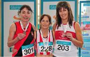 15 March 2015; Moira Peppard, centre, Trim AC, Co. Meath, winner of the Women's W50 60m event with second placed Carol Kearney, left, Lucan Harriers AC, and right, third placed Finuala Cooke, Galway City Harriers AC, during the GloHealth National Masters Indoor Track and Field Championships. Athlone International Arena, Athlone, Co. Westmeath. Picture credit: Tomás Greally / SPORTSFILE