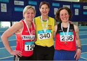 15 March 2015; Antionette O'Brien, centre, Gneeveguilla AC, Co. Kerry, winner of the Women's W40 High Jump event with second placed Isabel Breslin, left, Lifford AC, Co. Donegal and right, third placed Niamh McGuire, Rathkenny AC, Co. Meath, during the GloHealth National Masters Indoor Track and Field Championships. Athlone International Arena, Athlone, Co. Westmeath. Picture credit: Tomás Greally / SPORTSFILE