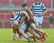 17 March 2015; Niall Campion, Rockwell College, is tackled by Ty Chan, Ardscoil Rís. SEAT Munster Schools Senior Cup Final, Rockwell College v Ardscoil Rís, Thomond Park, Limerick. Picture credit: David Maher / SPORTSFILE