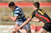 17 March 2015; Lee Molloy, Rockwell College, is tackled by Mathan Randles, Ardscoil Rís. SEAT Munster Schools Senior Cup Final, Rockwell College v Ardscoil Rís, Thomond Park, Limerick. Picture credit: David Maher / SPORTSFILE
