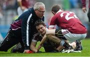 17 March 2015; Cormac O'Doherty, centre, Slaughtneil, is comforted on the pitch after the loss. AIB GAA Football All-Ireland Senior Club Championship Final, Corofin v Slaughtneil, Croke Park, Dublin. Picture credit: Cody Glenn / SPORTSFILE