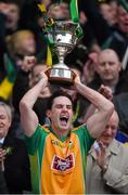 17 March 2015; Corofin's captain Michael Farragher lifts the Andy Merrigan cup. AIB GAA Football All-Ireland Senior Club Championship Final, Corofin, Co Galway, v Slaughtneil, Co Derry. Croke Park, Dublin. Picture credit: Ray McManus / SPORTSFILE