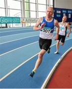15 March 2015; Ken Archbold, St. Laurence O' Toole AC, Co. Carlow, leads eventual winner Kevin McGlone, Sligo AC, during the Men's m45 800m event, during the GloHealth National Masters Indoor Track and Field Championships. Athlone International Arena, Athlone, Co. Westmeath. Picture credit: Tomás Greally / SPORTSFILE