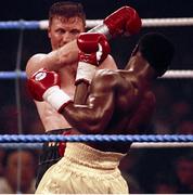 18 March 1995; Steve Collins, left, exchanges punches with Chris Eubank. WBO Super-Middleweight Title Fight, Steve Collins v Chris Eubank, Millstreet Arena, Co. Cork, Ireland. Picture credit; David Maher / SPORTSFILE