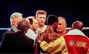 18 March 1995; Steve Collins, centre, looks on as reigning champion Chris Eubank takes issue with officials before the bout. WBO Super-Middleweight Title Fight, Steve Collins v Chris Eubank, Millstreet Arena, Co. Cork, Ireland. Picture credit; David Maher / SPORTSFILE