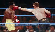 18 March 1995; Steve Collins, left, lands a left jab onto the face of Chris Eubank. WBO Super-Middleweight Title Fight, Steve Collins v Chris Eubank, Millstreet Arena, Co. Cork, Ireland. Picture credit; David Maher / SPORTSFILE