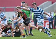 17 March 2015; Hugh Bourke, Ardscoil Rís, is tackled by Sean O'Connor, Rockwell College. SEAT Munster Schools Senior Cup Final, Rockwell College v Ardscoil Rís, Thomond Park, Limerick. Picture credit: David Maher / SPORTSFILE