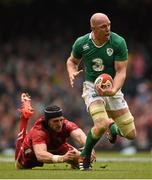 14 March 2015; Paul O'Connell, Ireland, is tackled by Luke Charteris, Wales. RBS Six Nations Rugby Championship, Wales v Ireland. Millennium Stadium, Cardiff, Wales. Picture credit: Stephen McCarthy / SPORTSFILE