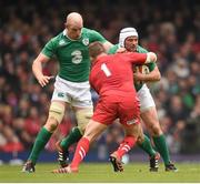 14 March 2015; Rory Best with the support of his Ireland team-mate is tackled by Gethin Jenkins, Wales. RBS Six Nations Rugby Championship, Wales v Ireland. Millennium Stadium, Cardiff, Wales. Picture credit: Stephen McCarthy / SPORTSFILE
