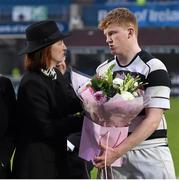 17 March 2015; Anne Foley, mother of the victorious CC Roscrea captain Tim Foley, is presnted with flowers by Belvedere College captain Mike Sweeney. Bank of Ireland Leinster Schools Senior Cup Final, in association with Beauchamps Solicitors, Belvedere College v Cistercian College Roscrea. RDS, Ballsbridge, Dublin. Picture credit: Stephen McCarthy / SPORTSFILE