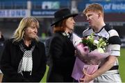 17 March 2015; Anne Foley, mother of the victorious CC Roscrea captain Tim Foley, is presnted with flowers by Belvedere College captain Mike Sweeney, in the company of his mother Dorothy Sweeney. Bank of Ireland Leinster Schools Senior Cup Final, in association with Beauchamps Solicitors, Belvedere College v Cistercian College Roscrea. RDS, Ballsbridge, Dublin. Picture credit: Stephen McCarthy / SPORTSFILE