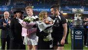 17 March 2015; Anne Foley, mother of the victorious CC Roscrea captain Tim Foley, is presented with flowers by Belvedere College captain Mike Sweeney, left, and Dorothy Sweeney, mother of Belvedere College captain Mike Sweeney, is presented with flowers by CC Roscrea captain Tim Foley. Bank of Ireland Leinster Schools Senior Cup Final, in association with Beauchamps Solicitors, Belvedere College v Cistercian College Roscrea. RDS, Ballsbridge, Dublin. Picture credit: Stephen McCarthy / SPORTSFILE