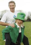 11 March 2009; Over 2,000 are expected at the Annual KBC Asset Management St. Patrickâ€™s 5k road race. Race starts and finishes on Dawson Street, 12pm Sunday the 15th March. Pictured with Athletics legend Eamonn Coghlan is Michelle Costello. Phoenix Park, Dublin. Picture credit: Brian Lawless / SPORTSFILE