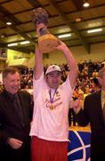 10 March 2000; Neptune captain Stephen McCarthy lifts the trophy after his side were crowned ESB Men's Basketball Superleague Champions for the 1999/2000 season following the ESB Men's Basketball Superleague match between Neptune and Star of the Sea at Neptune Stadium in Cork. Photo by Brendan Moran/Sportsfile