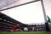 11 June 2000; Kildare's Padraig Graven scores his side's goal past Louth goalkeeper Colm Nally during the Bank of Ireland Leinster Senior Football Championship Quarter-Final match between Kildare and Louth at Croke Park in Dublin. Photo by Brendan Moran/Sportsfile