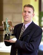 12 June 2000; Antrim goalkeeper Sean McGreevy, poses wtih the EIRCELL All-Star Player of the Month for May, at the Europa Hotel in Belfast. It was his performance against Down which earned Antrim's first football championship win in 18 years. Photo by Brendan Moran/Sportsfile