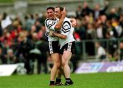 11 June 2000; Sligo players Sean Davey, left, and Paul Durcan celebrate their victory following the Bank of Ireland Connacht Senior Football Championship Quarter-Final match between Sligo and Mayo at Markievicz Park in Sligo. Photo by Damien Eagers/Sportsfile