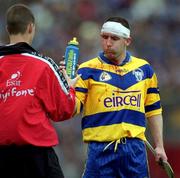 11 June 2000; Colin Lynch of Clare takes a drink after receiving treatment for a bloody headwound during the Guinness Munster Senior Hurling Championship Semi-Final match between Tipperary and Clare at Páirc Uí Chaoimh in Cork. Photo by Ray McManus/Sportsfile