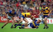 11 June 2000; Brian O'Meara, left, and Declan Ryan of Tipperary in action against Alan Markham and David Forde, right, of Clare during the Guinness Munster Senior Hurling Championship Semi-Final match between Tipperary and Clare at Páirc Uí Chaoimh in Cork. Photo by Ray McManus/Sportsfile