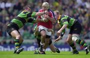 27 May 2000; Mike Mullins of Munster is tackled by Don MacKinnon, left, and Matt Allen of Northampton Saints during the Heineken Cup Final between Munster and Northampton Saints at Twickenham Stadium in London, England. Photo by Matt Browne/Sportsfile