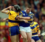 11 June 2000; Sean McMahon of Clare in action against Paul Shelly of Tipperary during the Guinness Munster Senior Hurling Championship Semi-Final match between Tipperary and Clare at Páirc Uí Chaoimh in Cork. Photo by Ray McManus/Sportsfile