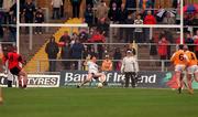 28 May 2000; Antrim goalkeeper Sean McGreevy saves a penalty from Gregory McCartan, 8, Down, during the Bank of Ireland Ulster Senior Football Championship Quarter-Final match between Antrim and Down at Casement Park in Belfast, Antrim. Photo by David Maher/Sportsfile