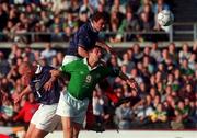 30 May 2000; Niall Quinn of Republic of Ireland in action against Christian Dailly and Matt Elliott, left, of Scotland during the International Friendly match between Republic of Ireland and Scotland at Lansdowne Road in Dublin. Photo by David Maher/Sportsfile