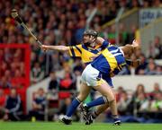 11 June 2000; Declan Ryan of Tipperary in action against Sean McMahon of Clare during the Guinness Munster Senior Hurling Championship Semi-Final match between Tipperary and Clare at Páirc Uí Chaoimh in Cork. Photo by Ray McManus/Sportsfile