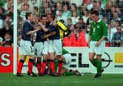 30 May 2000; Scotland's Barry Ferguson is congratulated on scoring his sides second goal by team-mates Neil McCann, 9, and Gary Nasmyth, 3, during the International Friendly match between Republic of Ireland and Scotland at Lansdowne Road in Dublin. Photo by David Maher/Sportsfile