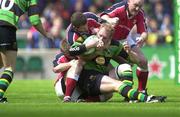 27 May 2000; Matt Allen of Northampton Saints is tackled by Munster players, from left, Ronan O'Gara, Dominic Crotty and Keith Wood during the Heineken Cup Final between Munster and Northampton Saints at Twickenham Stadium in London, England. Photo by Brendan Moran/Sportsfile