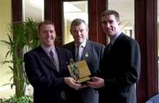 12 June 2000; Antrim goalkeeper Sean McGreevy is presented wtih the EIRCELL All-Star Player of the Month for May, by Niall O'Sullivan, Director of Finance and Corporate Services, Eircell, right, and Sean McCague, GAA President, centre, at the Europa Hotel in Belfast. It was his performance against Down which earned Antrim's first football championship win in 18 years. Photo by Brendan Moran/Sportsfile