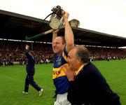 11 June 2000; Tipperary's John Leahy celebrates his side's victory following the Guinness Munster Senior Hurling Championship Semi-Final match between Tipperary and Clare at Páirc Uí Chaoimh in Cork. Photo by Ray McManus/Sportsfile