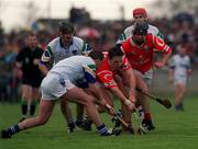 26 March 2000; Alan Browne of Cork in action against James O'Connor of Waterford during the Church & General National Hurling League Division 1B Round 4 match between Waterford and Cork at Walsh Park in Waterford. Photo by Aoife Rice/Sportsfile