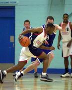 9 January 2000; Brian Benjamin of Denny Notre Dame in action against David Donnelly of St Vincent's during the ESB Men's Superleague Basketball match between St Vincent's and Denny Notre Dame at St Vincent's Basketball Club in Glasnevin, Dublin. Photo by Brendan Moran/Sportsfile