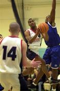 9 January 2000; Brian Benjamin of Denny Notre Dame goes up for a basket as Ferdinand Williams of St Vincent's comes to challenge during the ESB Men's Superleague Basketball match between St Vincent's and Denny Notre Dame at St Vincent's Basketball Club in Glasnevin, Dublin. Photo by Brendan Moran/Sportsfile