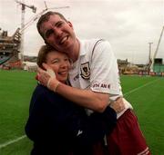 17 March 2000; Brian Hanley of St Mary's Athenry is congratulated by his mother Maureen following the AIB All-Ireland Senior Club Hurling Championship Final between St Mary's Athenry, Galway, and St Josephs Doora Barefield, Clare, at Croke Park in Dublin. Photo by Ray McManus/Sportsfile