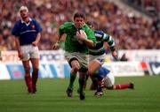 19 March 2000; Ireland's Brian O'Driscoll on his way to scoring his third try during the Six Nations Rugby Championship match between France and Ireland at Stade de France in Paris, France. Photo by Ray Lohan/Sportsfile