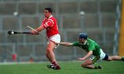 27 May 2000; Derek Barrett of Cork in action against John Maher of Kerry during the Guinness Munster Senior Hurling Championship Quarter-Final match between Kerry and Cork at Fitzgerald Stadium in Killarney, Kerry. Photo by Ray Lohan/Sportsfile