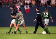 12 June 1996; Republic of Ireland's Niall Quinn, left, is restrained by manager Mick McCarthy after Liam Daish was sent off by referee Raul Dominguez during the US Cup match between Mexico and Republic of Ireland at Giants Stadium in East Rutherford, New Jersey, USA. Photo by Ray McManus/Sportsfile