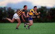 28 May 2000; Jamesie O'Connor of Clare in action against Andy Comerford of Kilkenny during the Senior Hurling Challenge match between Kilkenny and Clare at Young Ireland's GAA Ground in Kilkenny. Photo by Ray McManus/Sportsfile