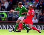 21 May 2000; Jason McAteer of Republic of Ireland in action against Danny Murphy of Liverpool during the Steve Staunton and Tony Cascarino Testimonial match between Republic of Ireland and Liverpool at Lansdowne Road in Dublin. Photo by Brendan Moran/Sportsfile