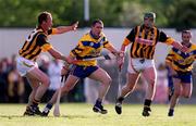 28 February 2000; Colin Lynch of Clare in action against Andy Comerford of Kilkenny during the Senior Hurling Challenge match between Kilkenny and Clare at Young Ireland's GAA Ground in Gowran, Kilkenny. Photo by Ray McManus/Sportsfile