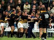 22 April 2000; Spectators look on as Buccaneers and Young Munster players are involved in a heated exchange during the AIB All-Ireland League Division 1 match between Young Munster and Buccaneers at Tom Clifford Park in Limerick. Photo by Ray Lohan/Sportsfile